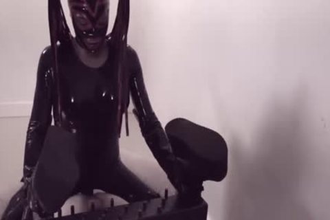 Fetish tranny In Latex Suit And Mask pokes