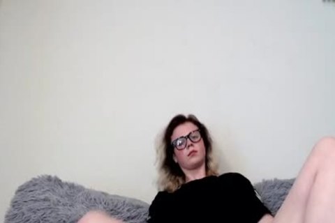 Petite shemale beauty In  Glasses Stroking Her large penis Until she sperm Shottting