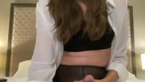 slim brunette hair American ladyboy In dark pantyhose Strokes Her big cock